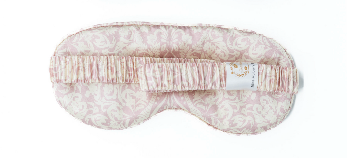 Masque de nuit en soie imprimé rose pâle